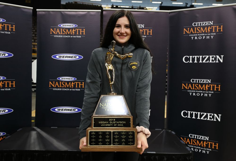 Iowa Hawkeyes forward Megan Gustafson (10) with the Naismith Player Of The Year Trophy during the teamÕs Celebr-Eight event Wednesday, April 24, 2019 at Carver-Hawkeye Arena. (Brian Ray/hawkeyesports.com)