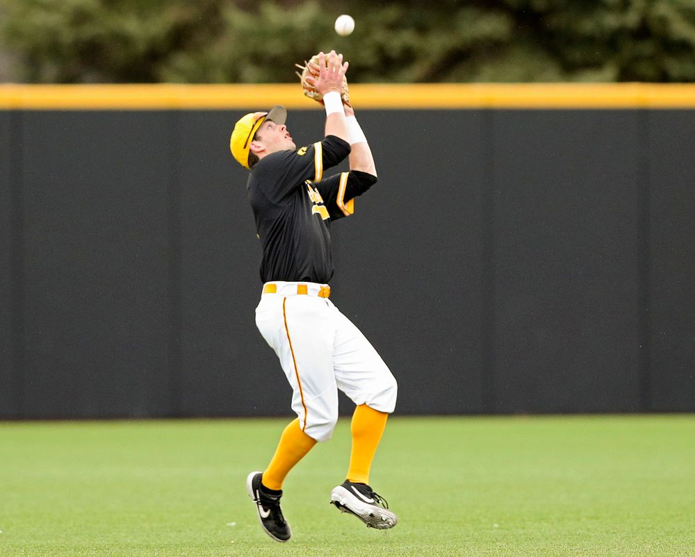 Iowa Hawkeyes second baseman Mitchell Boe (4) pulls in a pop up for an out during the fifth inning of their game against Illinois State at Duane Banks Field in Iowa City on Wednesday, Apr. 3, 2019. (Stephen Mally/hawkeyesports.com)