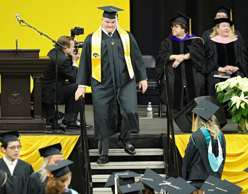 Iowa offensive lineman Spencer Williams during the College of Liberal Arts and Sciences and University College Fall 2019 Commencement ceremony at Carver-Hawkeye Arena in Iowa City on Saturday, December 21, 2019. (Stephen Mally/hawkeyesports.com)