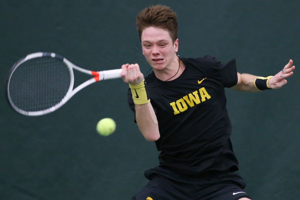 Iowa’s Jason Kerst hits a forehand during the Iowa men’s tennis meet vs VCU  on Saturday, February 29, 2020 at the Hawkeye Tennis and Recreation Complex. (Lily Smith/hawkeyesports.com)