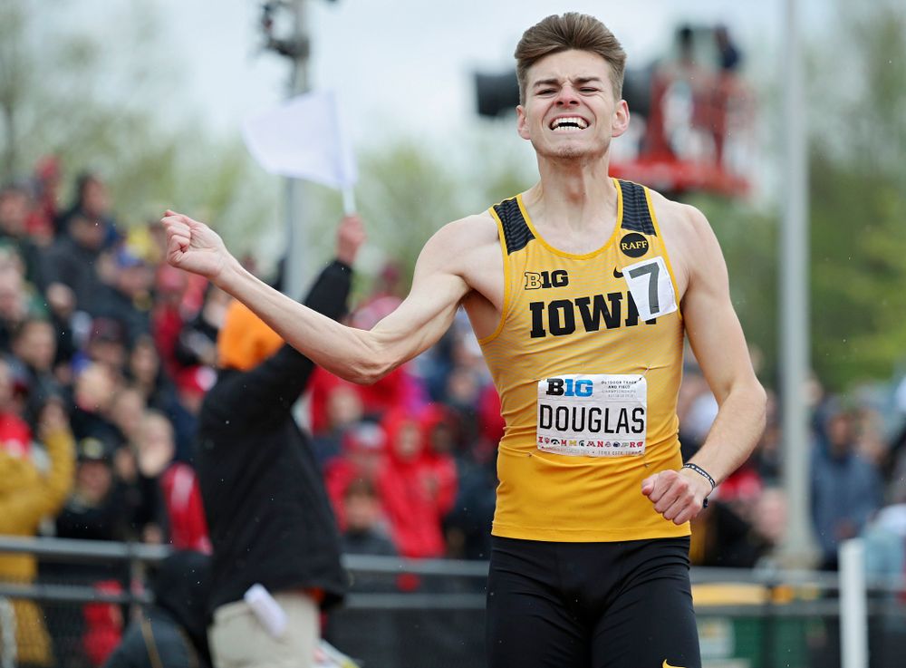 Iowa's Chris Douglas pumps his fist after winning the men’s 400 meter hurdles event on the third day of the Big Ten Outdoor Track and Field Championships at Francis X. Cretzmeyer Track in Iowa City on Sunday, May. 12, 2019. (Stephen Mally/hawkeyesports.com)