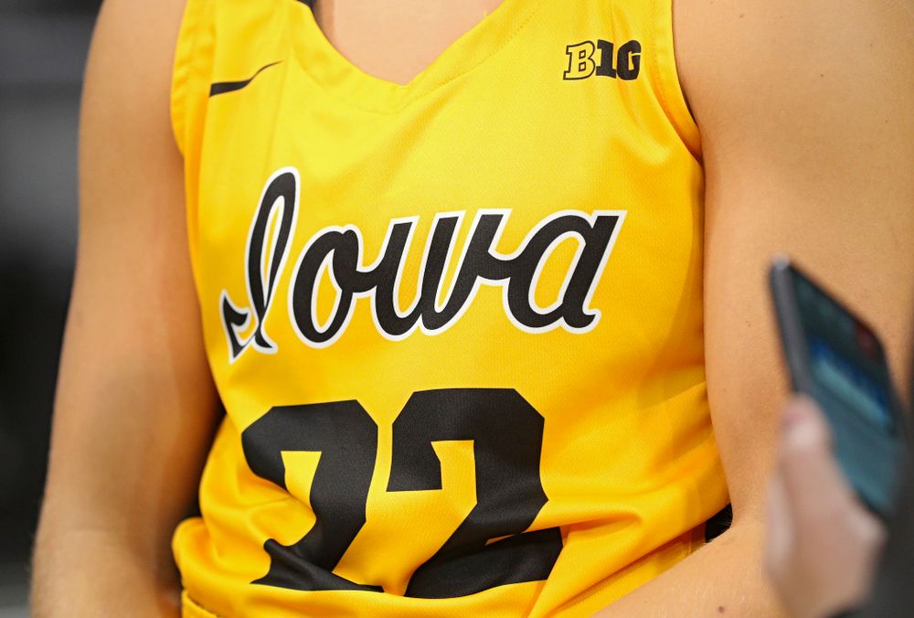 Iowa guard Kathleen Doyle (22) wears a new alternate uniform as she answers questions during Iowa Women’s Basketball Media Day at Carver-Hawkeye Arena in Iowa City on Thursday, Oct 24, 2019. (Stephen Mally/hawkeyesports.com)