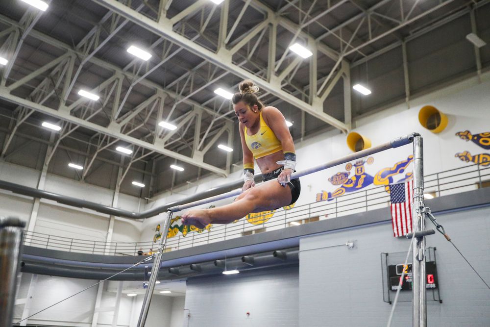 Maddie Kampschroeder performs on the uneven bars during the Iowa women’s gymnastics Black and Gold Intraquad Meet on Saturday, December 7, 2019 at the UI Field House. (Lily Smith/hawkeyesports.com)
