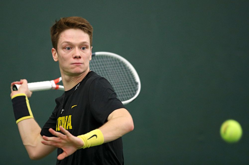 Iowa’s Jason Kerst returns a shot during their match at the Hawkeye Tennis and Recreation Complex in Iowa City on Thursday, January 16, 2020. (Stephen Mally/hawkeyesports.com)