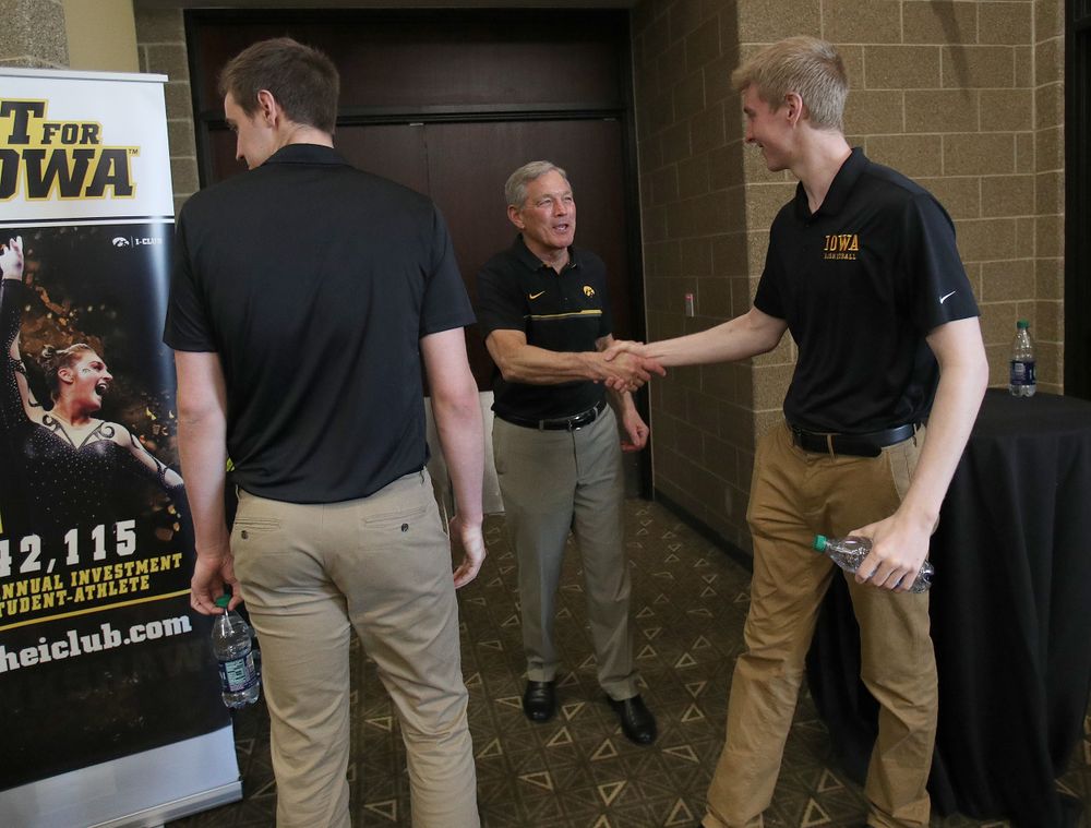 Nicholas Baer, Kirk Ferentz, Michael Baer -- Hawkeye Fan Event at the Quad-Cities Waterfront Convention Center in Bettendorf, Iowa, on May 15, 2019.