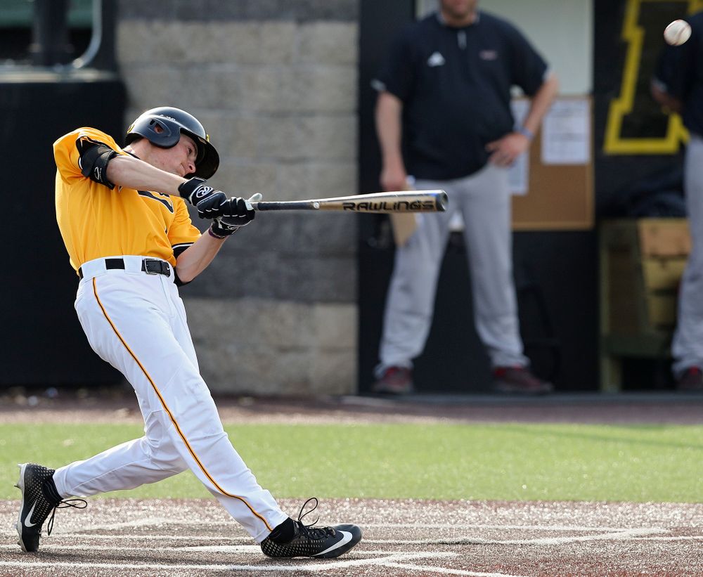 Iowa Hawkeyes center fielder Ben Norman (9) hits an RBI single during the third inning of their game against Northern Illinois at Duane Banks Field in Iowa City on Tuesday, Apr. 16, 2019. (Stephen Mally/hawkeyesports.com)