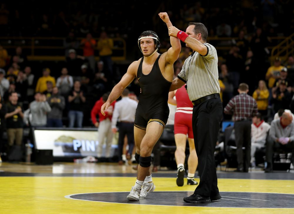IowaÕs Michael Kemerer wrestles WisconsinÕs Jared Krattinger at 174 pounds Sunday, December 1, 2019 at Carver-Hawkeye Arena. Kemerer won the match with a fall. (Brian Ray/hawkeyesports.com)
