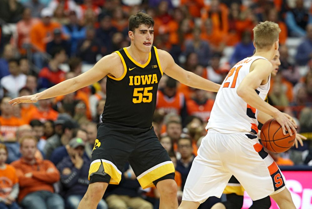 Iowa Hawkeyes center Luka Garza (55) defends during the second half of their ACC/Big Ten Challenge game at the Carrier Dome in Syracuse, N.Y. on Tuesday, Dec 3, 2019. (Stephen Mally/hawkeyesports.com)