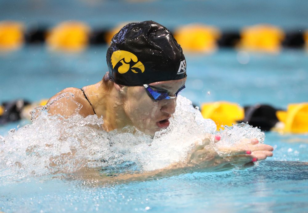 Iowa's Sage Ohlensehlen swims the breaststroke leg of the 200 yard medley relay during a double dual against Wisconsin and Northwestern Saturday, January 19, 2019 at the Campus Recreation and Wellness Center. (Brian Ray/hawkeyesports.com)