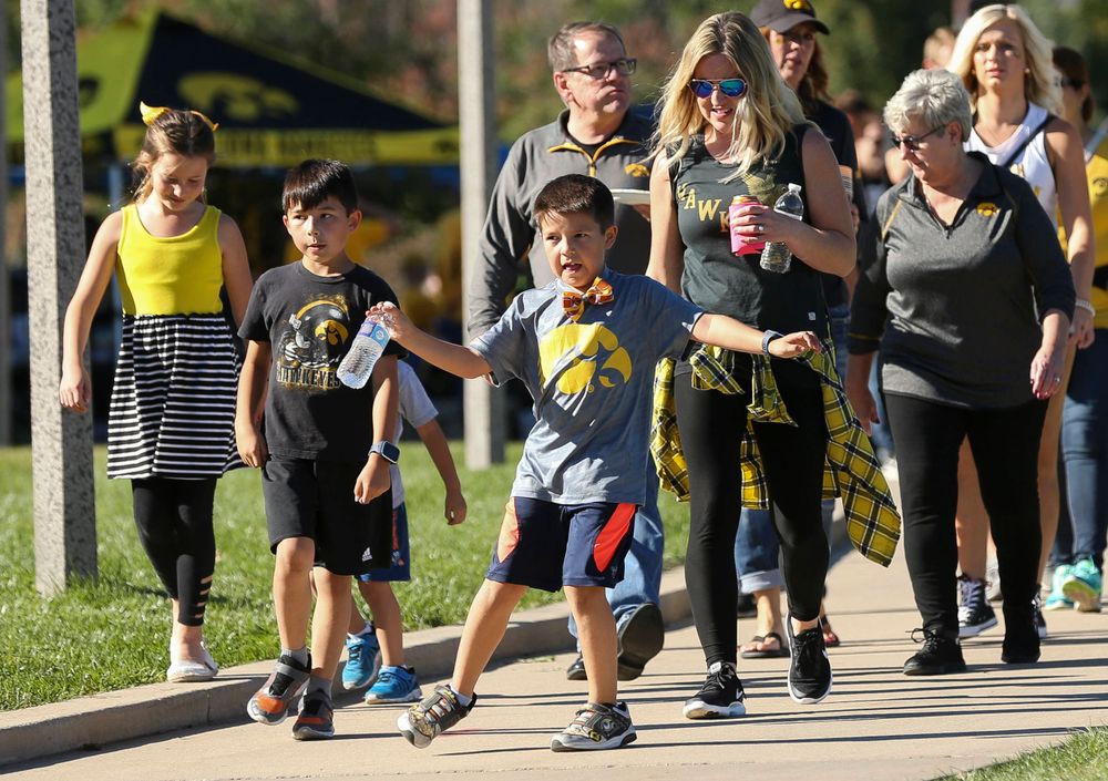 Fans make their way toward Kinnick Stadium before a game against Wisconsin on September 22, 2018.