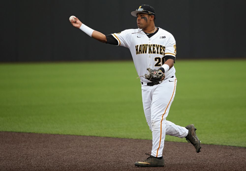 Iowa second baseman Izaya Fullard (20) throws to first base for an out during the first inning of their college baseball game at Duane Banks Field in Iowa City on Wednesday, March 11, 2020. (Stephen Mally/hawkeyesports.com)