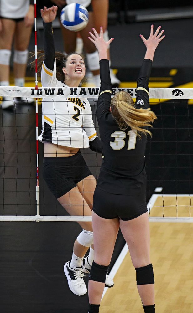 Iowa’s Courtney Buzzerio (2) goes up for a kill during the first set of their Big Ten/Pac-12 Challenge match against Colorado at Carver-Hawkeye Arena in Iowa City on Friday, Sep 6, 2019. (Stephen Mally/hawkeyesports.com)