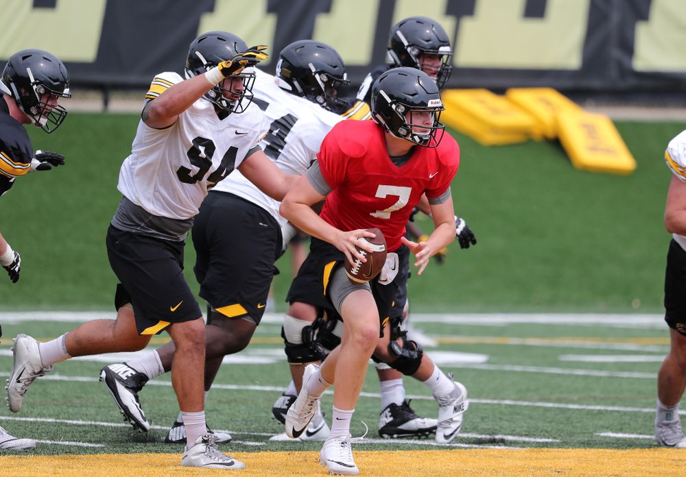 Iowa Hawkeyes quarterback Spencer Petras (7) and defensive end A.J. Epenesa (94) during the third practice of fall camp Sunday, August 5, 2018 at the Kenyon Football Practice Facility. (Brian Ray/hawkeyesports.com)