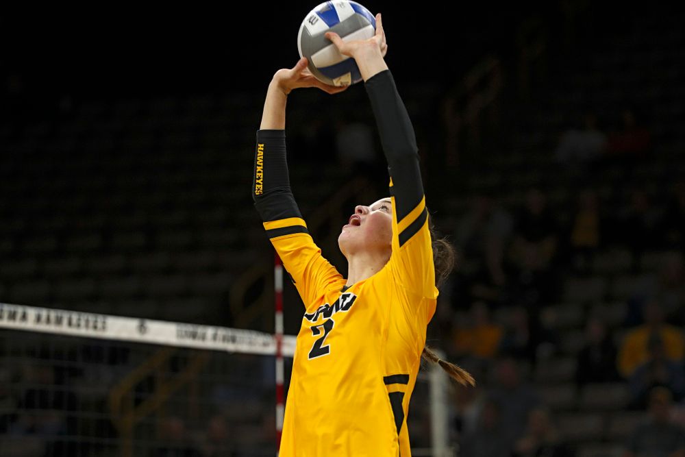 Iowa’s Courtney Buzzerio (2) sets the ball during the third set of their match against Illinois at Carver-Hawkeye Arena in Iowa City on Wednesday, Nov 6, 2019. (Stephen Mally/hawkeyesports.com)