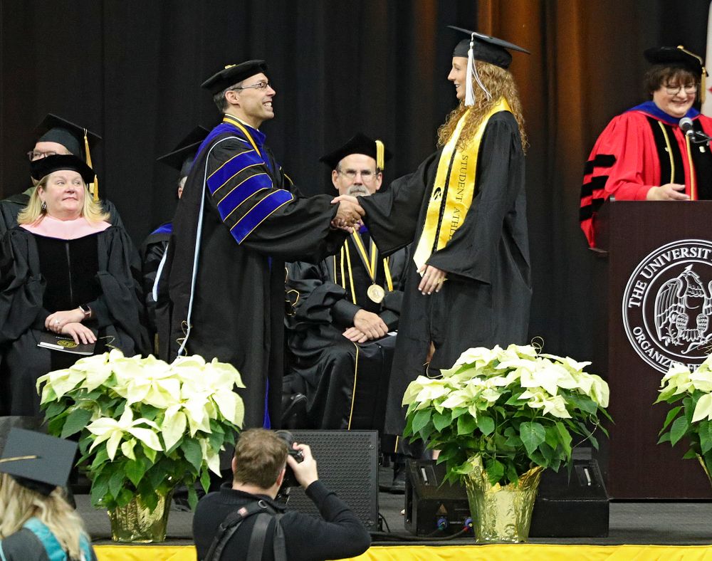 Iowa Track and Field’s Kylie Morken during the College of Liberal Arts and Sciences and University College Fall 2019 Commencement ceremony at Carver-Hawkeye Arena in Iowa City on Saturday, December 21, 2019. (Stephen Mally/hawkeyesports.com)