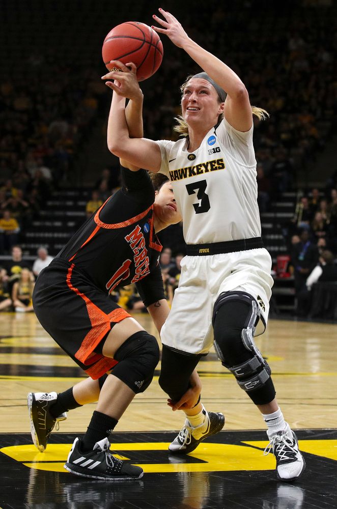 Iowa Hawkeyes guard Makenzie Meyer (3) tries to pull in a rebound during the first round of the 2019 NCAA Women's Basketball Tournament at Carver Hawkeye Arena in Iowa City on Friday, Mar. 22, 2019. (Stephen Mally for hawkeyesports.com)