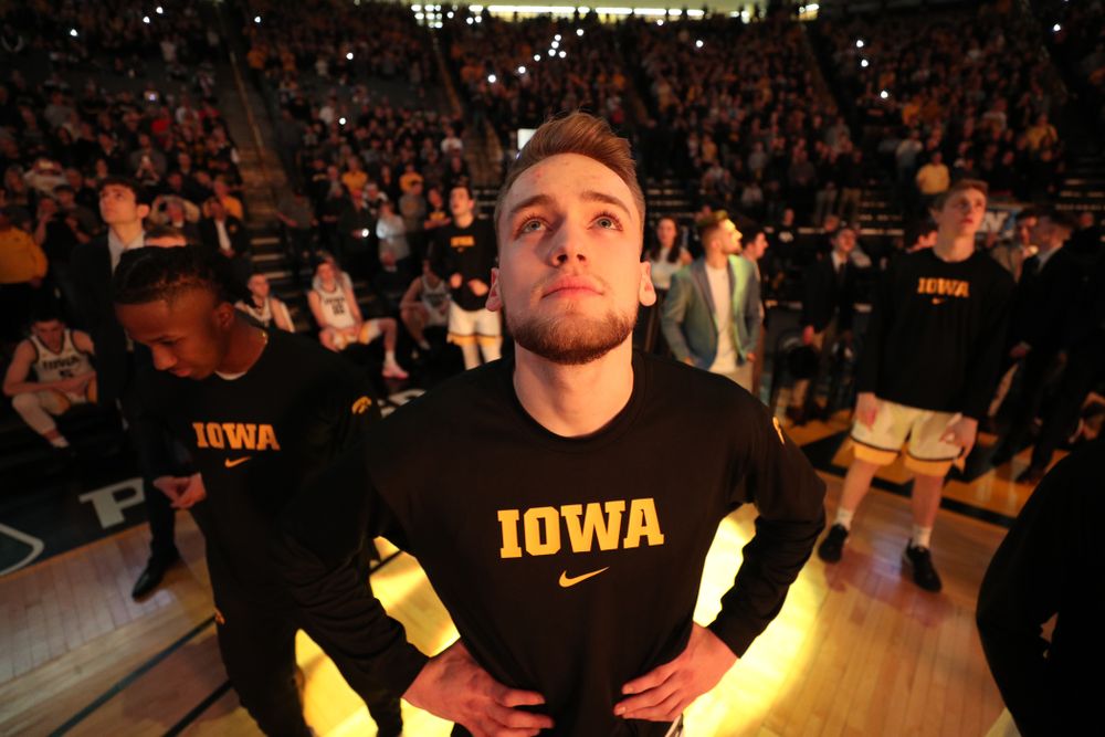 Iowa Hawkeyes forward Riley Till (20) watches the intro video before their game against the Purdue Boilermakers Tuesday, March 3, 2020 at Carver-Hawkeye Arena. (Brian Ray/hawkeyesports.com)