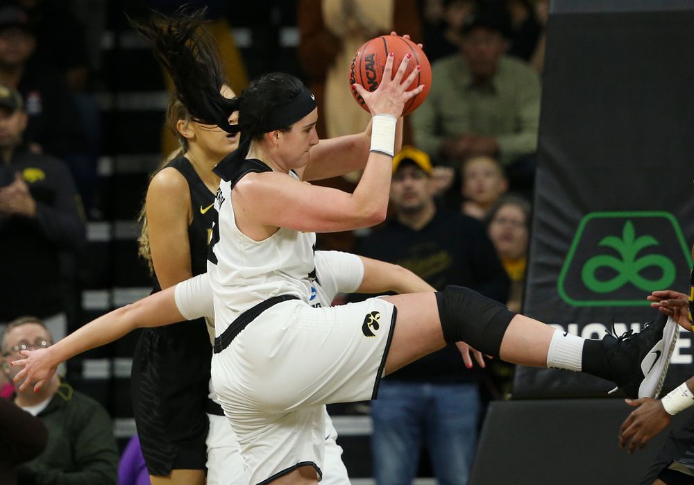 Iowa Hawkeyes center Megan Gustafson (10) pulls in a rebound during the third quarter of their second round game in the 2019 NCAA Women's Basketball Tournament at Carver Hawkeye Arena in Iowa City on Sunday, Mar. 24, 2019. (Stephen Mally for hawkeyesports.com)