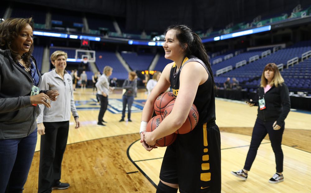 Iowa Hawkeyes forward Megan Gustafson (10) talks with the ESPN Crew following practice for their Sweet 16 matchup against NC State Friday, March 29, 2019 at the Greensboro Coliseum in Greensboro, NC.(Brian Ray/hawkeyesports.com)