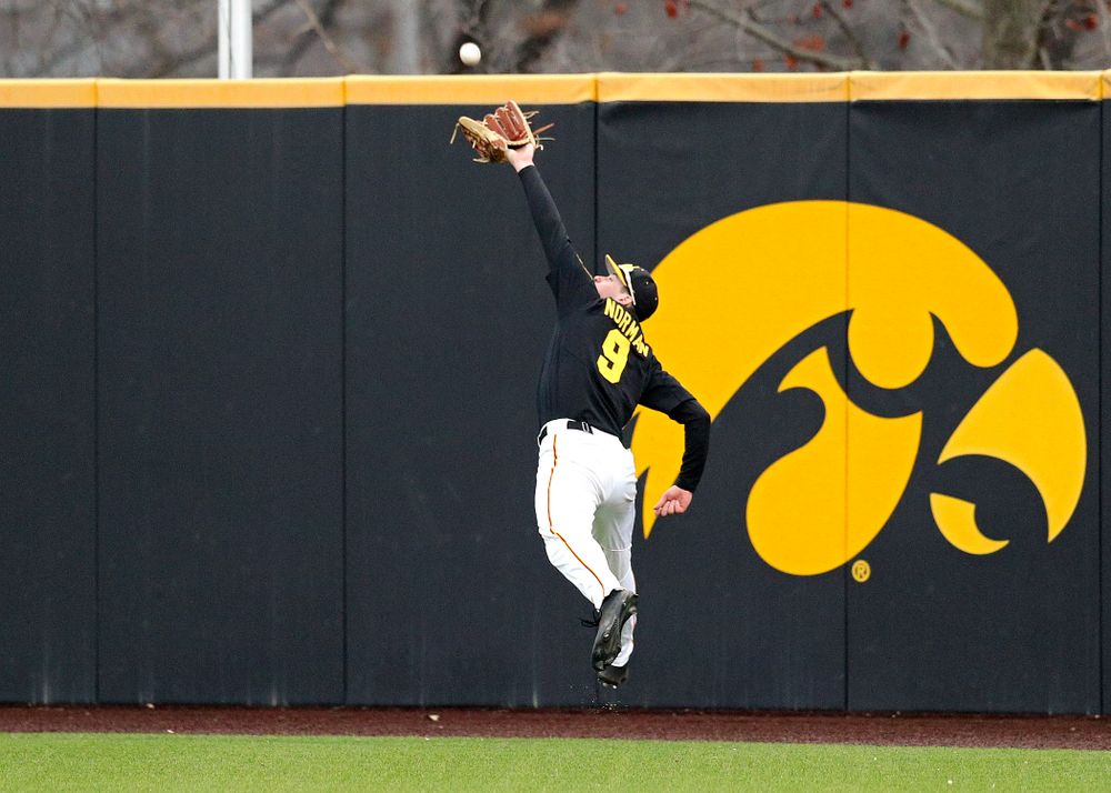 Iowa outfielder Ben Norman (9) makes a running catch for an out during the ninth inning of their college baseball game at Duane Banks Field in Iowa City on Tuesday, March 10, 2020. (Stephen Mally/hawkeyesports.com)