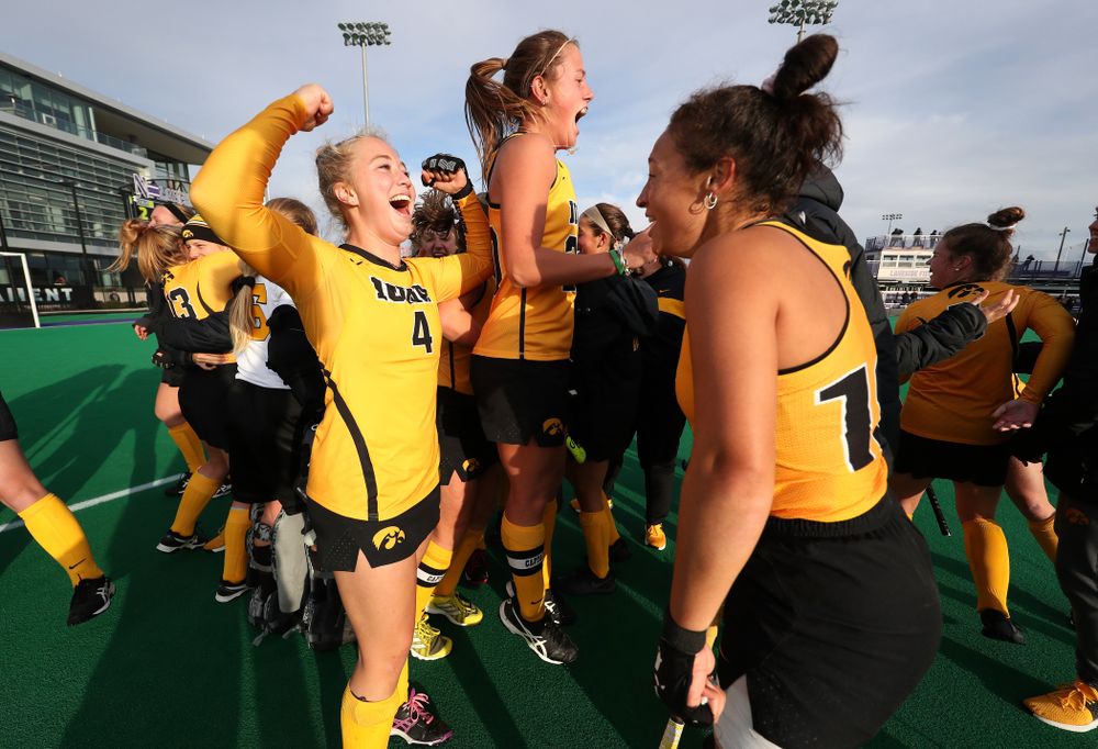 Iowa Hawkeyes Makenna Grewe (4), Sophie Sunderland (20), and Mya Christopher (18) celebrate their 2-1 victory over the Michigan Wolverines in the semi-finals of the Big Ten Tournament Friday, November 2, 2018 at Lakeside Field on the campus of Northwestern University in Evanston, Ill. (Brian Ray/hawkeyesports.com)