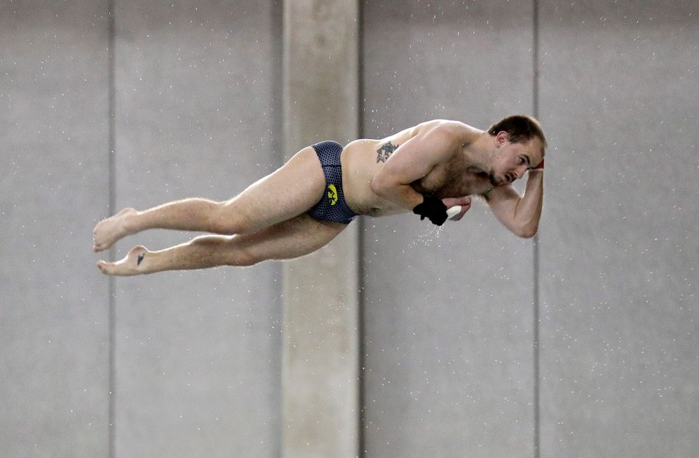 Iowa’s Anton Hoherz competes in the platform diving event during their meet at the Campus Recreation and Wellness Center in Iowa City on Friday, February 7, 2020. (Stephen Mally/hawkeyesports.com)