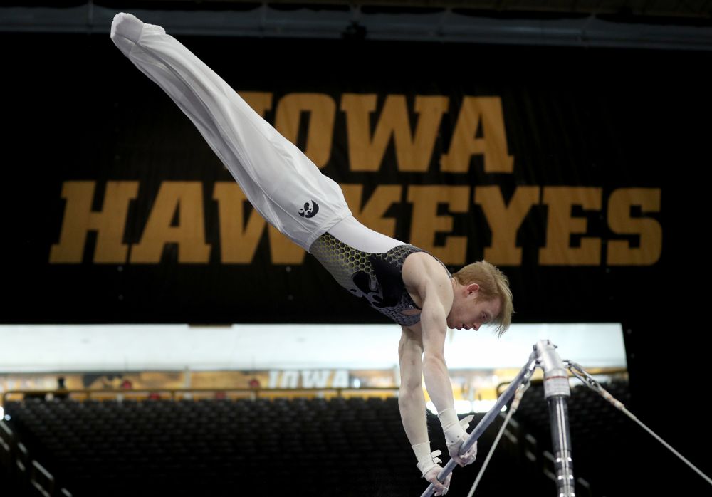 Iowa’s Nick Merryman competes on the high bar against Illinois Sunday, March 1, 2020 at Carver-Hawkeye Arena. (Brian Ray/hawkeyesports.com)