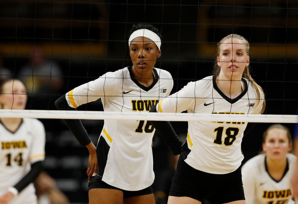 Iowa Hawkeyes outside hitter Taylor Louis (16) and middle blocker Hannah Clayton (18) against Eastern Illinois Sunday, September 9, 2018 at Carver-Hawkeye Arena. (Brian Ray/hawkeyesports.com)