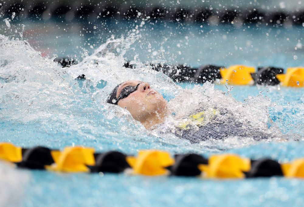 IowaÕs Emily Sansome swims the 100 yard backstroke against the Michigan Wolverines Friday, November 1, 2019 at the Campus Recreation and Wellness Center. (Brian Ray/hawkeyesports.com)
