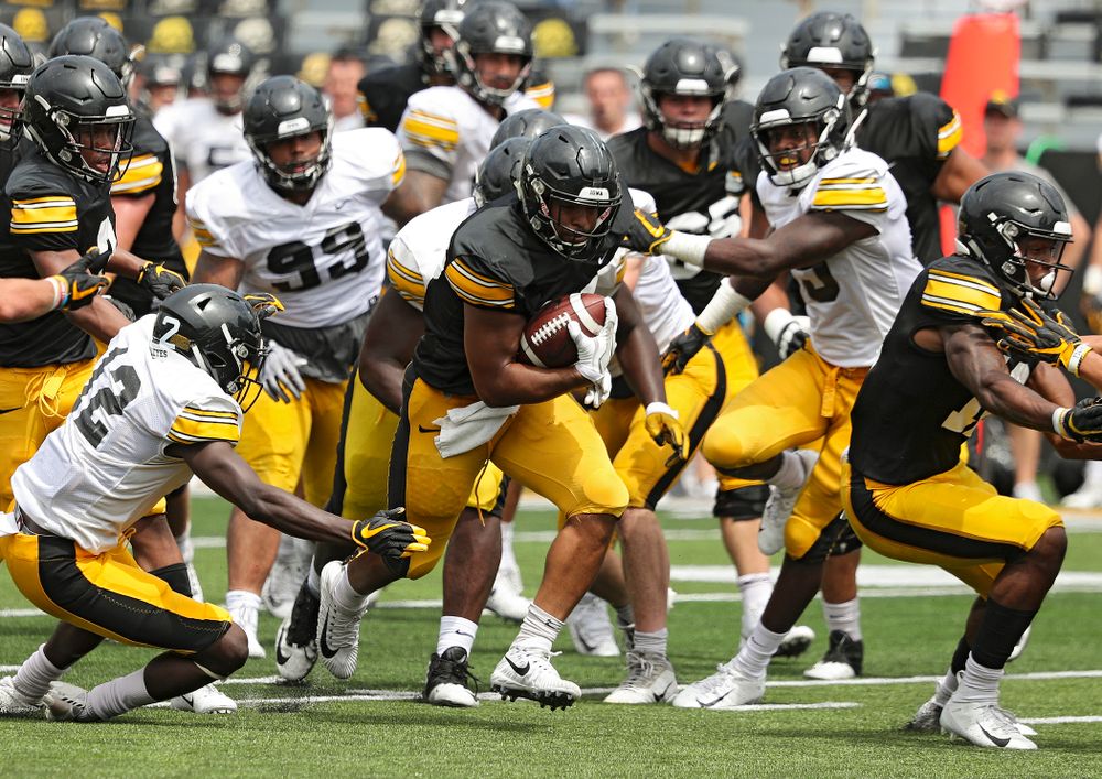 Iowa Hawkeyes running back Toren Young (28) on a run during Fall Camp Practice No. 8 at Kids Day at Kinnick Stadium in Iowa City on Saturday, Aug 10, 2019. (Stephen Mally/hawkeyesports.com)