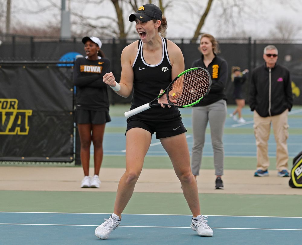 Iowa's Elise van Heuvelen Treadwell celebrates a point during their doubles match against Rutgers at the Hawkeye Tennis and Recreation Complex in Iowa City on Friday, Apr. 5, 2019. (Stephen Mally/hawkeyesports.com)
