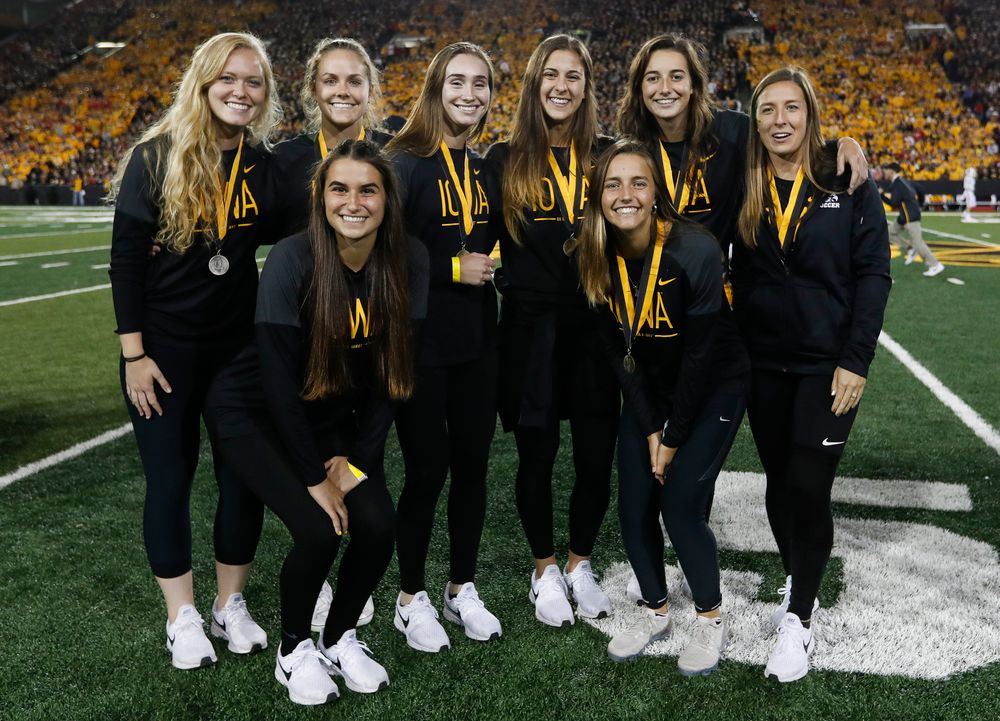 Members of the Iowa soccer team are recognized by the Presidential Committee on Athletics at halftime during a game against Wisconsin on September 22, 2018. (Tork Mason/hawkeyesports.com)