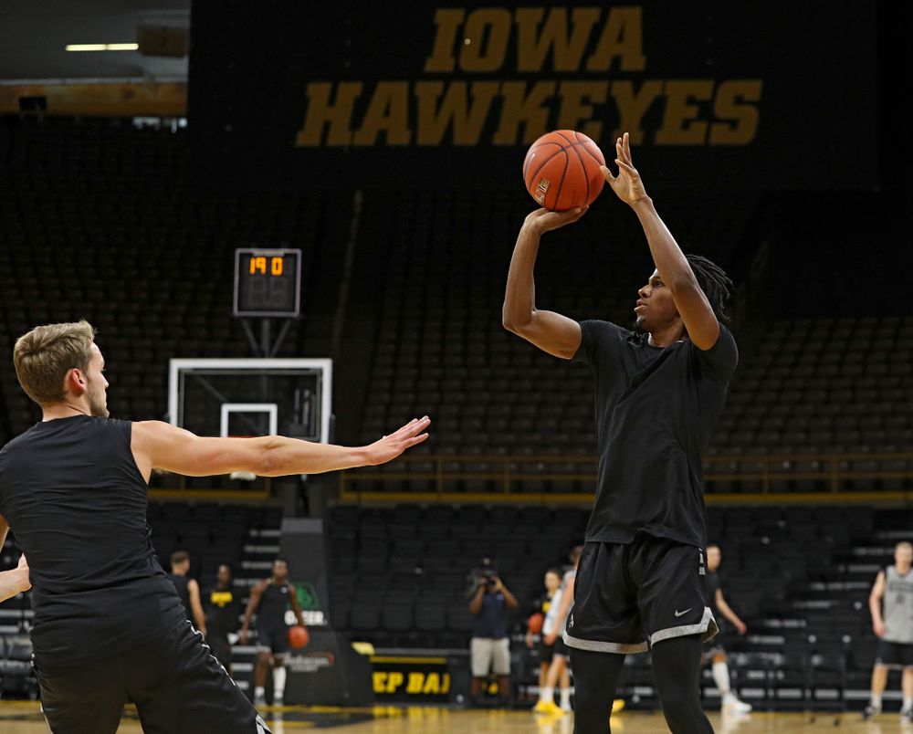 Iowa Hawkeyes guard Bakari Evelyn (4) shoots during practice at Carver-Hawkeye Arena in Iowa City on Wednesday, Oct 9, 2019. (Stephen Mally/hawkeyesports.com)
