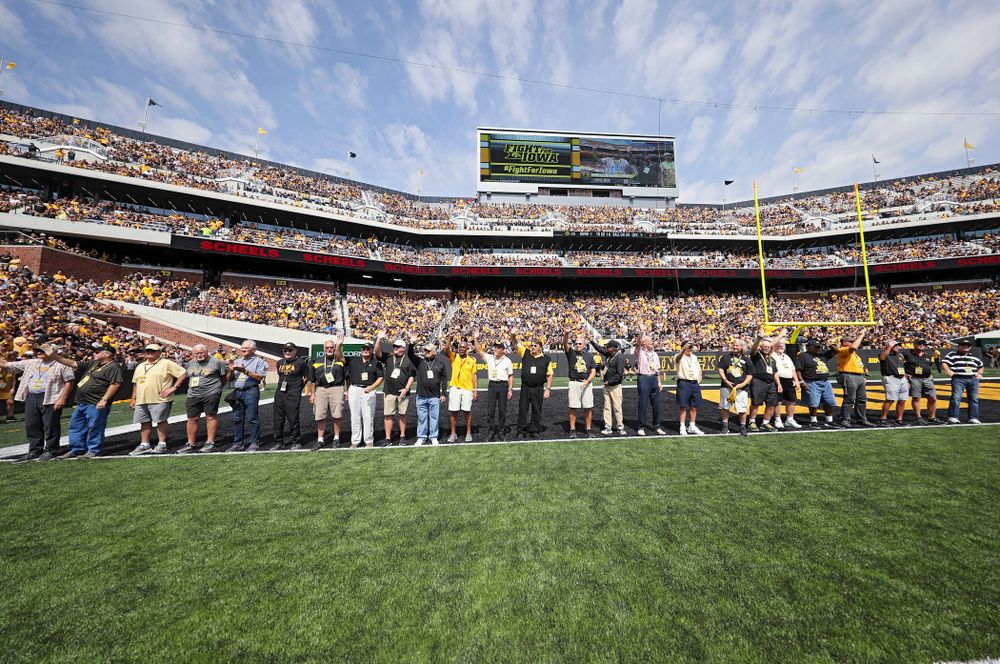 Members of the Iowa Hawkeyes 1969 football team are recognized during the third quarter of their Big Ten Conference football game at Kinnick Stadium in Iowa City on Saturday, Sep 7, 2019. (Stephen Mally/hawkeyesports.com)
