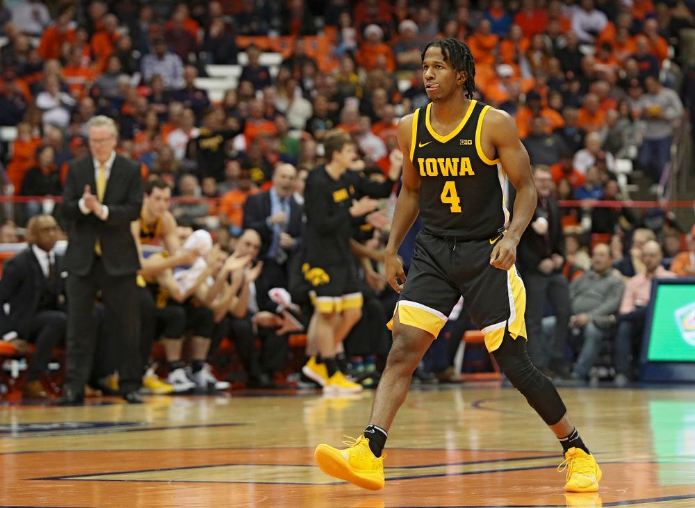 Iowa Hawkeyes guard Bakari Evelyn (4) sticks out his tongue after making a 3-pointer during the first half of their ACC/Big Ten Challenge game at the Carrier Dome in Syracuse, N.Y. on Tuesday, Dec 3, 2019. (Stephen Mally/hawkeyesports.com)