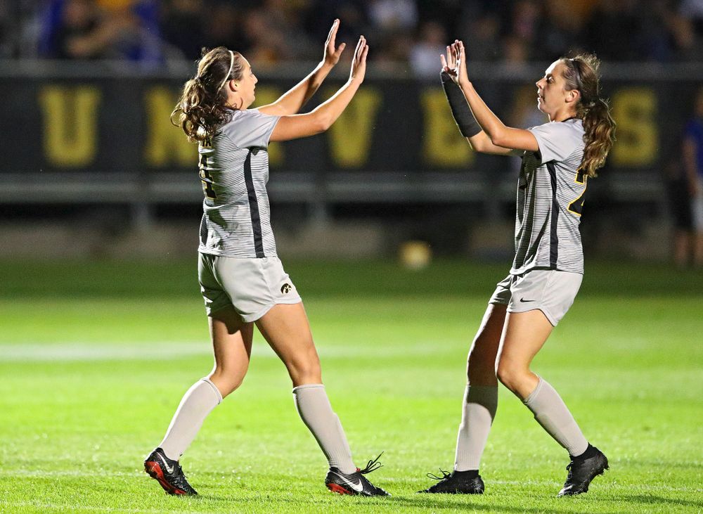 Iowa forward Kaleigh Haus (4) celebrates with midfielder Josie Durr (25) after scoring a goal during the second half of their match at the Iowa Soccer Complex in Iowa City on Friday, Sep 13, 2019. (Stephen Mally/hawkeyesports.com)