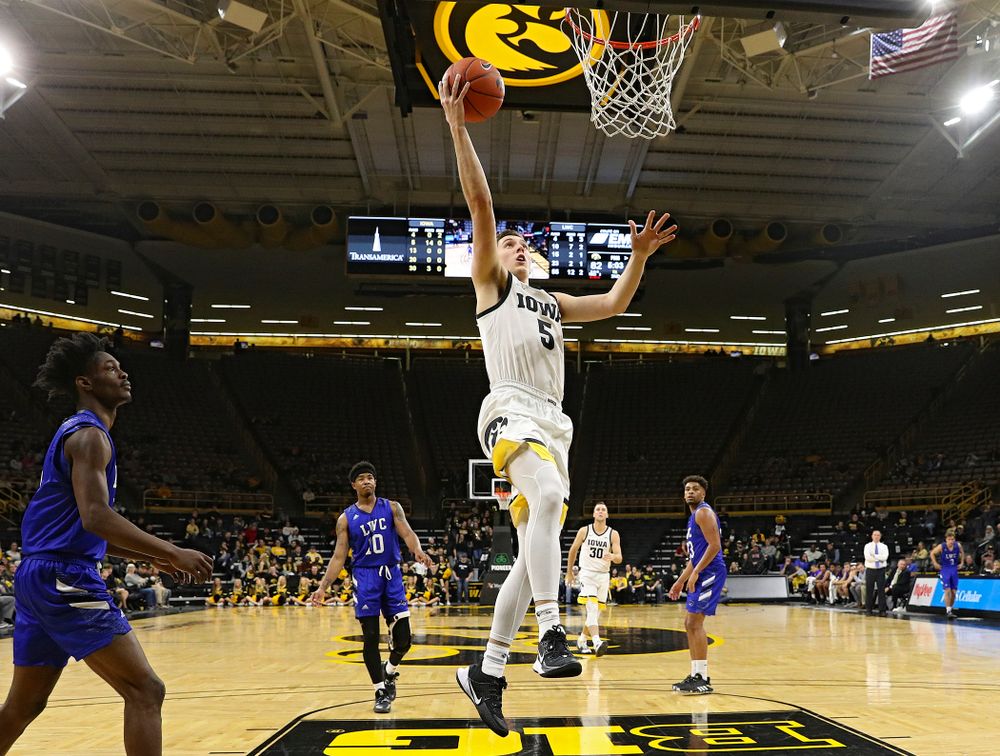 Iowa Hawkeyes guard CJ Fredrick (5) makes a basket during the second half of their exhibition game against Lindsey Wilson College at Carver-Hawkeye Arena in Iowa City on Monday, Nov 4, 2019. (Stephen Mally/hawkeyesports.com)