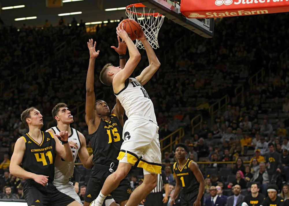 Iowa Hawkeyes guard Joe Wieskamp (10) scores a basket inside during the second half of their their game at Carver-Hawkeye Arena in Iowa City on Sunday, December 29, 2019. (Stephen Mally/hawkeyesports.com)