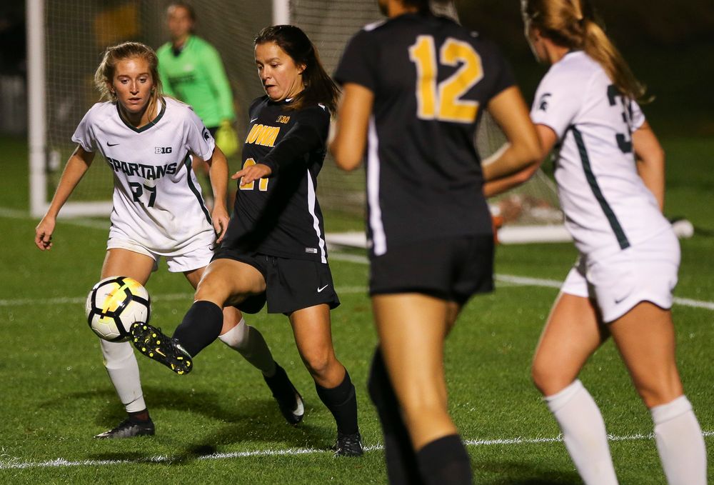 Iowa Hawkeyes forward Emma Tokuyama (21) passes the ball during a game against Michigan State at the Iowa Soccer Complex on October 12, 2018. (Tork Mason/hawkeyesports.com)