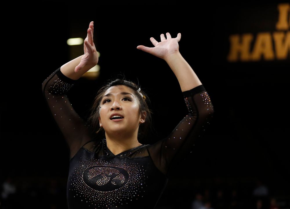 Nicole Chow competes on the floor  