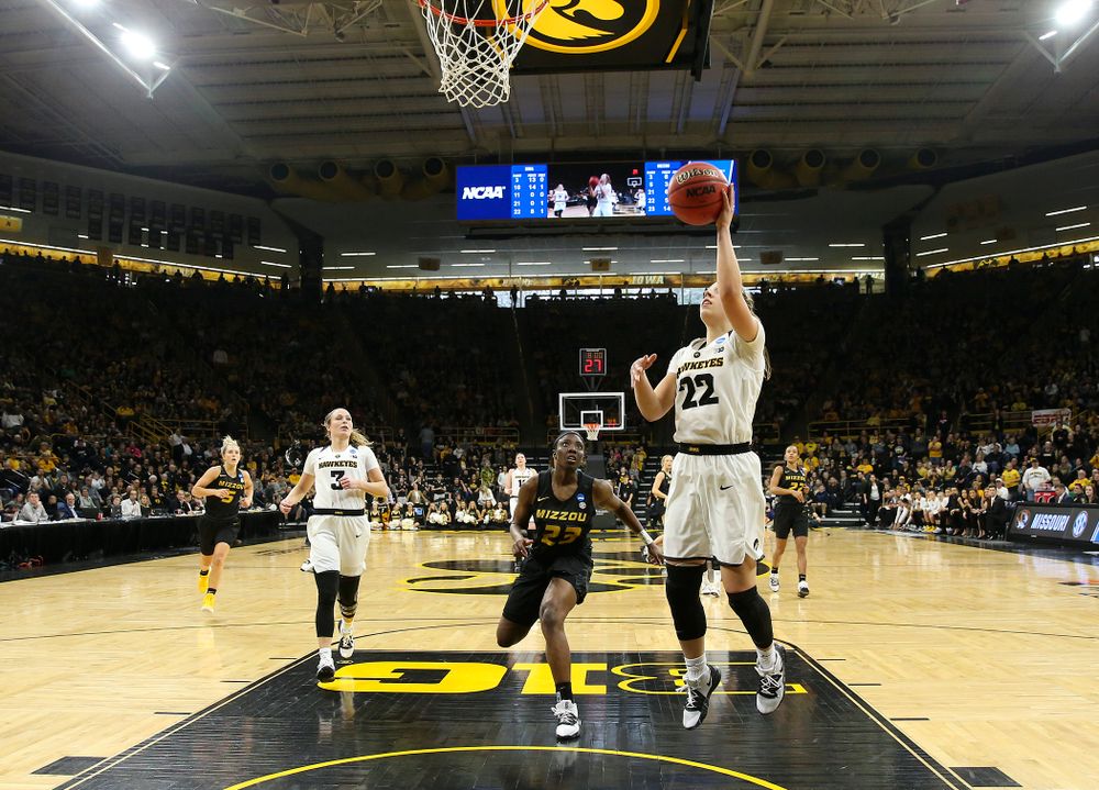 Iowa Hawkeyes guard Kathleen Doyle (22) scores a basket during the third quarter of their second round game in the 2019 NCAA Women's Basketball Tournament at Carver Hawkeye Arena in Iowa City on Sunday, Mar. 24, 2019. (Stephen Mally for hawkeyesports.com)
