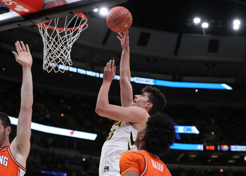 Iowa Hawkeyes forward Luka Garza (55) against the Illinois Fighting Illini in the 2019 Big Ten Men's Basketball Tournament Thursday, March 14, 2019 at the United Center in Chicago. (Brian Ray/hawkeyesports.com)