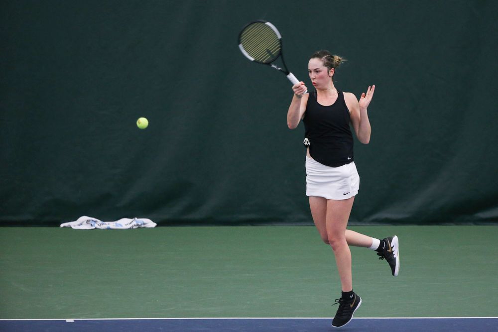 Iowa’s Samantha Mannix returns a hit during the Iowa women’s tennis meet vs DePaul  on Friday, February 21, 2020 at the Hawkeye Tennis and Recreation Complex. (Lily Smith/hawkeyesports.com)