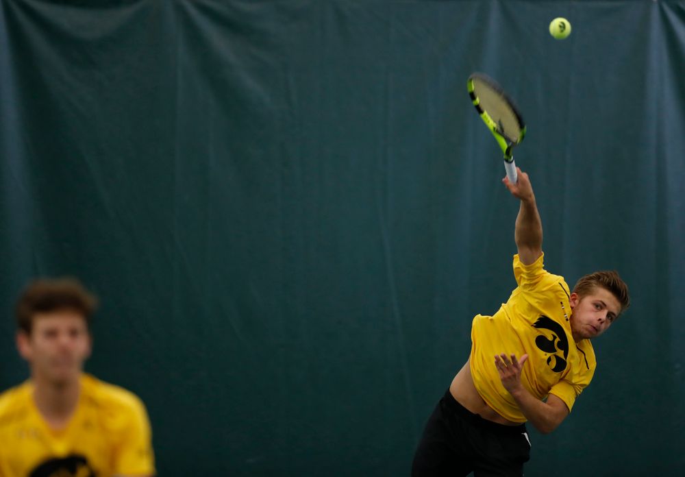 Will Davies and and Piotr Smietana play a doubles match against the Illinois Fighting Illini Saturday, March 31, 2018 at Hawkeye Tennis and Recreation Center. (Brian Ray/hawkeyesports.com)