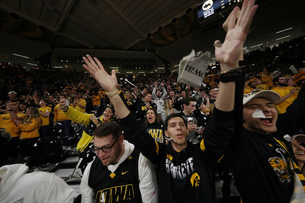 The Hawks Nest throws paper in the air after the Iowa Hawkeyes first basket against the Nebraska Cornhuskers Saturday, February 8, 2020 at Carver-Hawkeye Arena. (Brian Ray/hawkeyesports.com)
