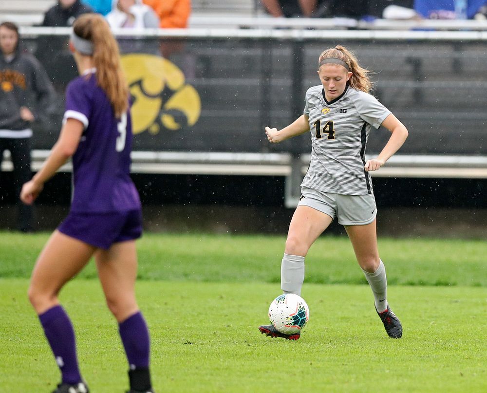 Iowa defender Leah Moss (14) moves with the ball during the first half of their match at the Iowa Soccer Complex in Iowa City on Sunday, Sep 29, 2019. (Stephen Mally/hawkeyesports.com)