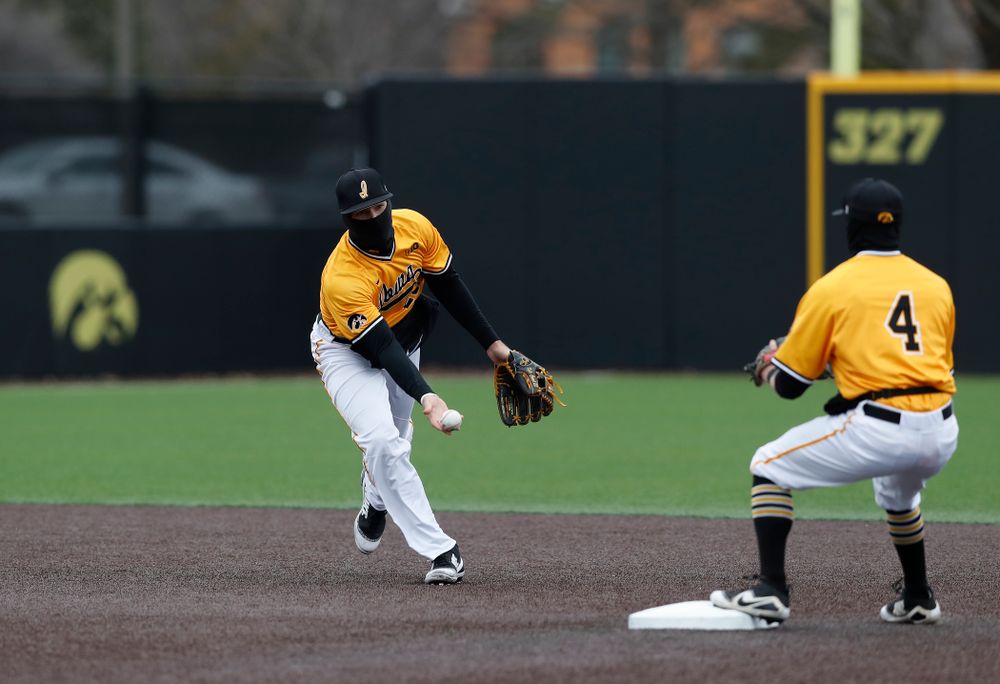 Iowa Hawkeyes infielder Kyle Crowl (23) and infielder Mitchell Boe (4) against the Ohio State Buckeyes Sunday, April 8, 2018 at Duane Banks Field.(Brian Ray/hawkeyesports.com)
