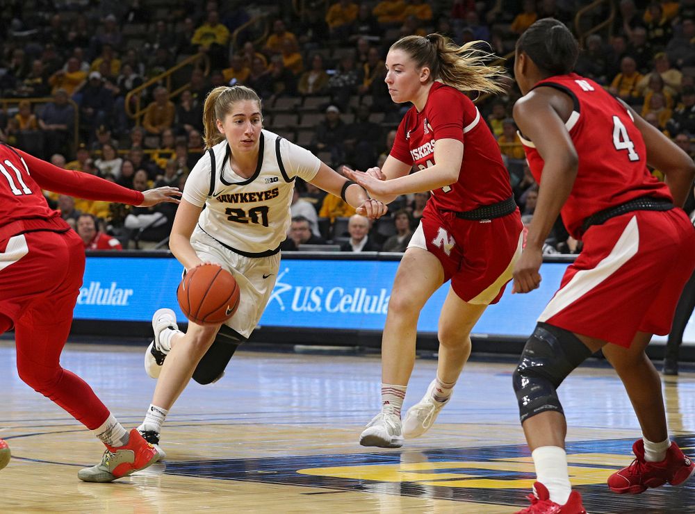 Iowa Hawkeyes guard Kate Martin (20) drives with the ball during the third quarter of the game at Carver-Hawkeye Arena in Iowa City on Thursday, February 6, 2020. (Stephen Mally/hawkeyesports.com)