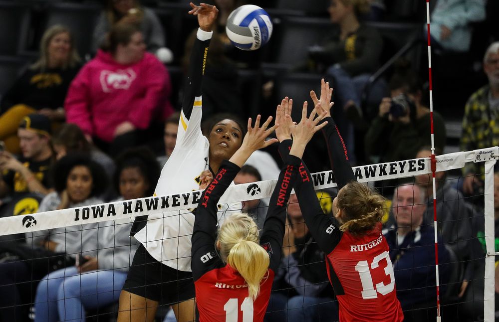 Iowa Hawkeyes outside hitter Taylor Louis (16) spikes the ball during a match against Rutgers at Carver-Hawkeye Arena on November 2, 2018. (Tork Mason/hawkeyesports.com)
