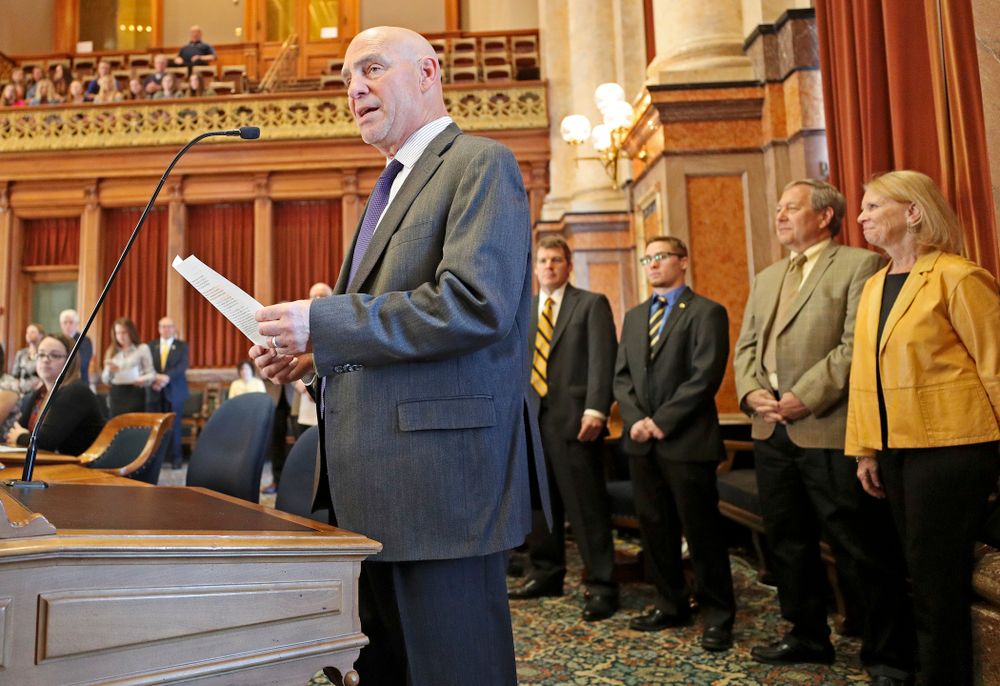 State Rep. Dave Jacoby (left) introduces House Resolution 22 to honor Iowa's Spencer Lee (center) in the House Chamber at the Iowa State Capitol Building on Tuesday, Apr. 9, 2019. (Stephen Mally/hawkeyesports.com)